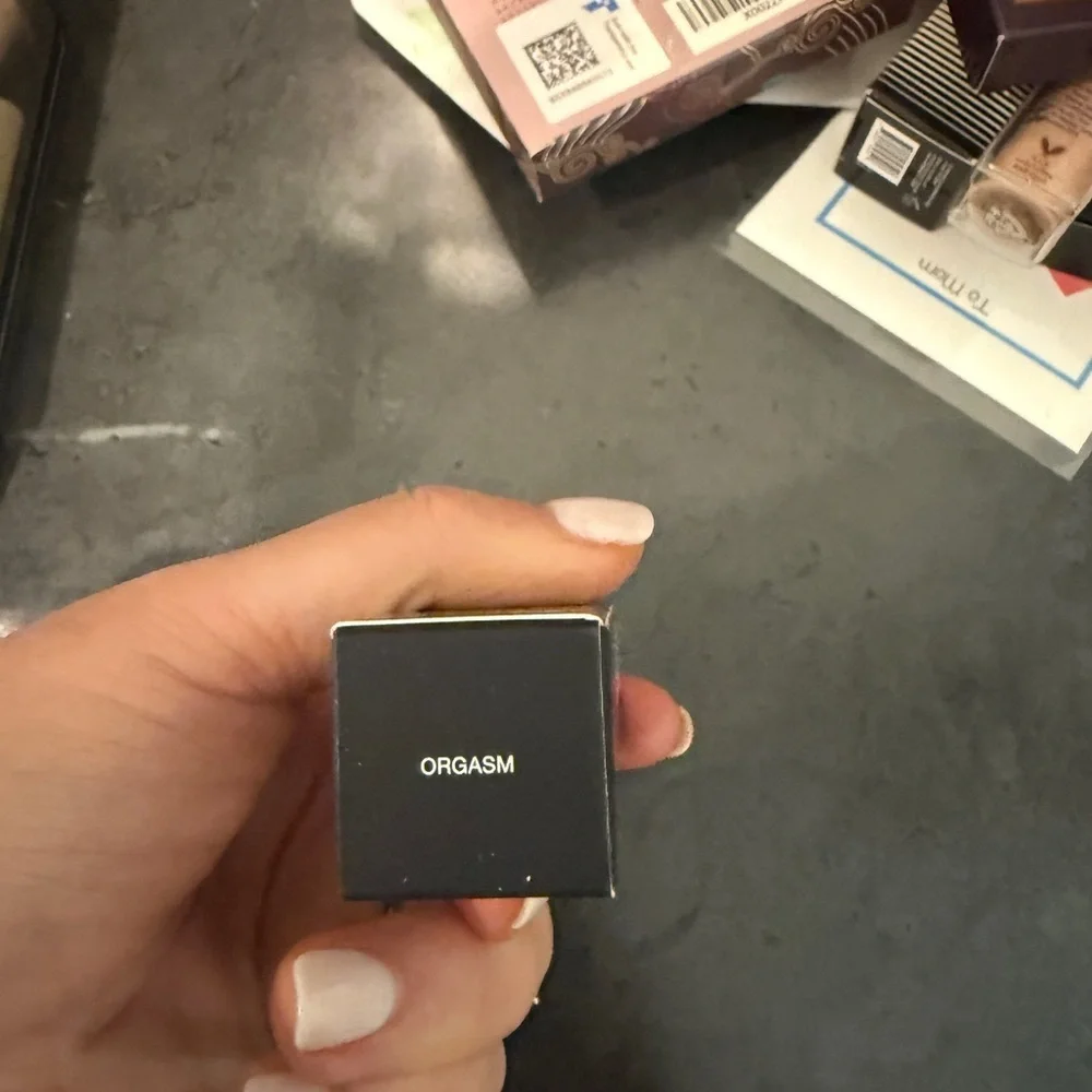 NARS Lip Balm in Shade Orgasm pink tone